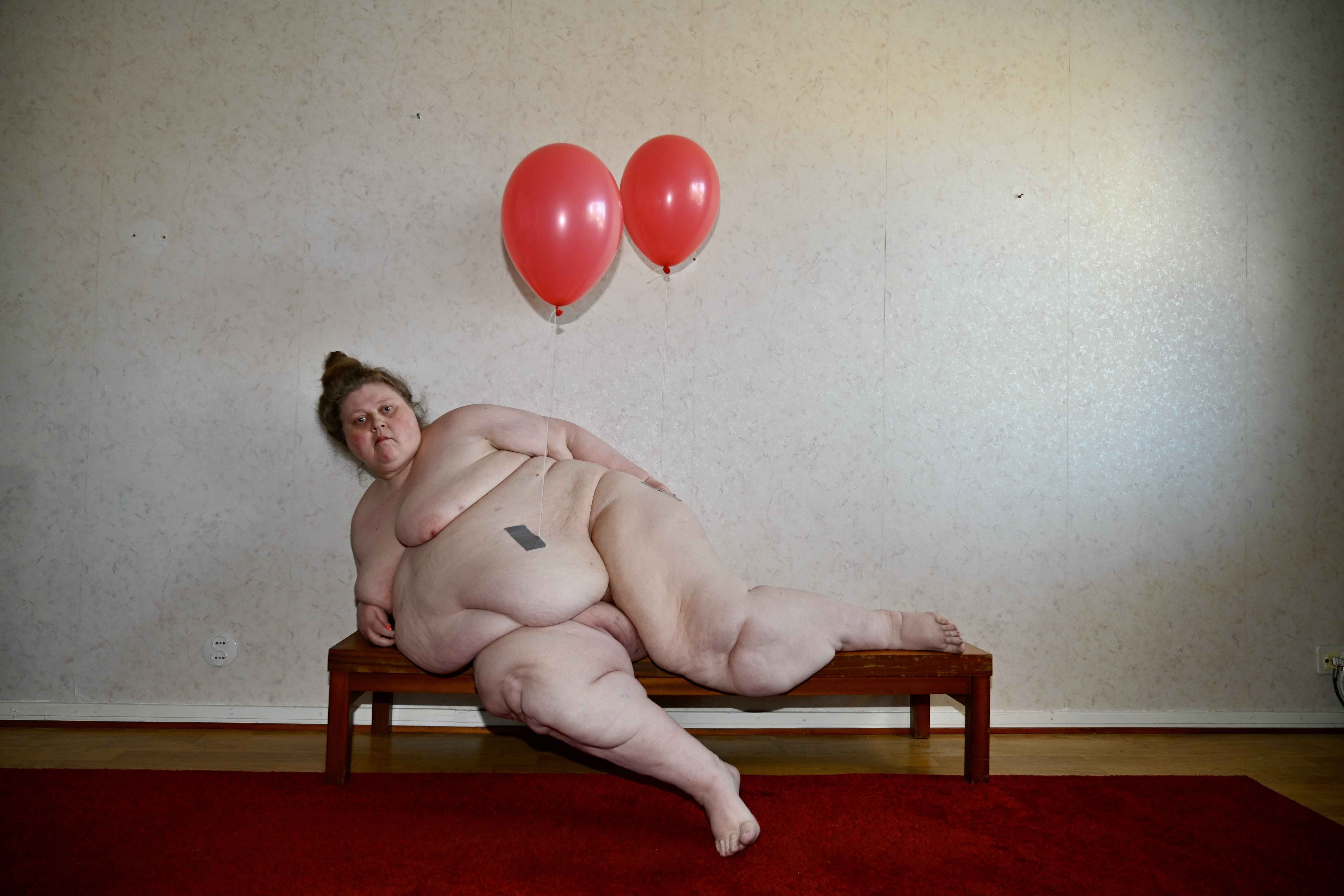 Iiu Susiraja, <i>Lift Up, Stomach</i>, 2025. Fine art archival pigment print, 32 x 48 in (81.3 x 121.9 cm)